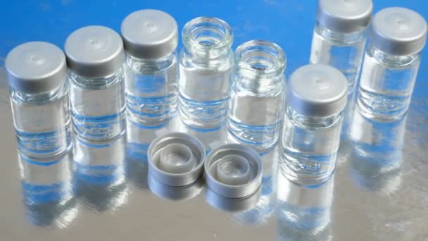 Veel Flessen Met Covid Coronavirus Vaccin Productiegeneesmiddel Vaccin — Stockvideo