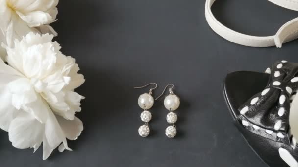 Bunch White Peony Earrings Pearls Woman Bag Shoes Black Background — Stock Video