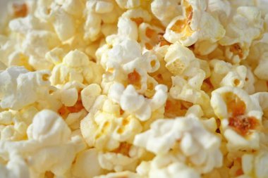 Lezzetli patlamış mısır arka planı, üst görünüm, yakın çekim, makro, patlamış mısır, yakın çekim