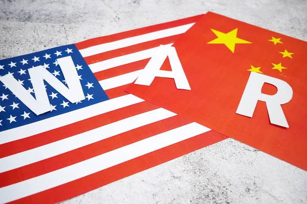 USA & China - disagreement, US of America and Chinese flags. Relationship conflict between USA and China. Trade deal, closeup