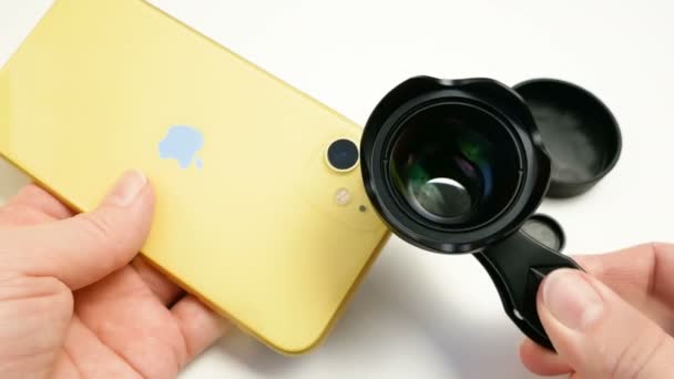 Dnipro Ukraine 2021 Yellow Smartphone External Lens Clip White Background — Stockvideo