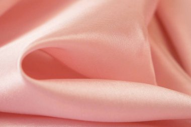 Açık pembe kumaş dokusu, ipek arkaplan, yüzey, yakın plan