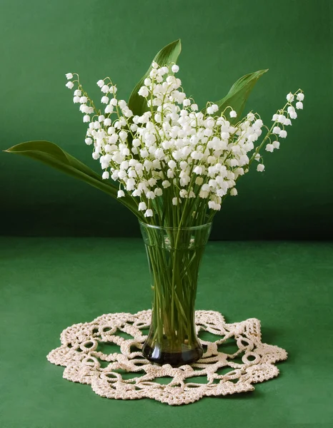 Still life with lily of the valley flowers bunch on artistic background — Stock Photo, Image