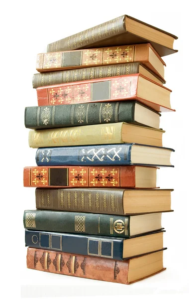 Old book pile isolated on white background — Stock Photo, Image