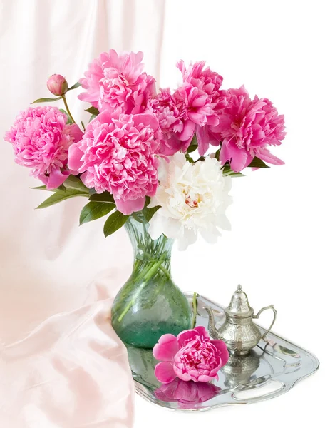 Bunch of peonies in vase on silver tray isolated on white — Stock Photo, Image
