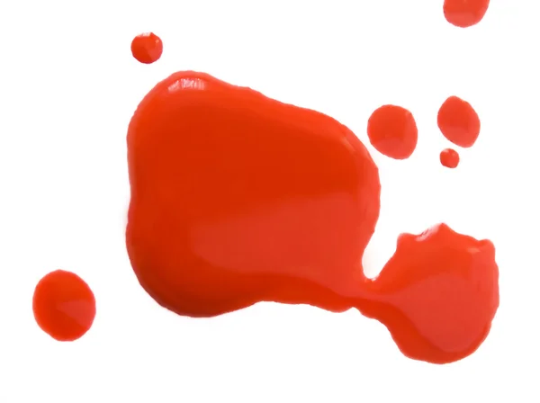 Close up de sangue vermelho abstrato gotas sobre fundo branco — Fotografia de Stock