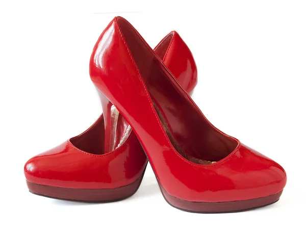 Rode schoenen paar geïsoleerd op witte achtergrond — Stockfoto