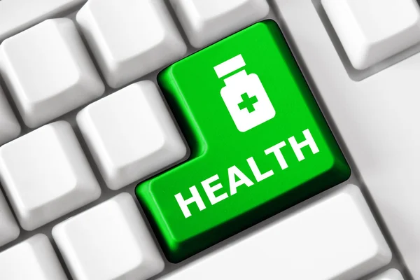 Color button on the keyboard with concept image and text (medicine and health) — Stock Photo, Image