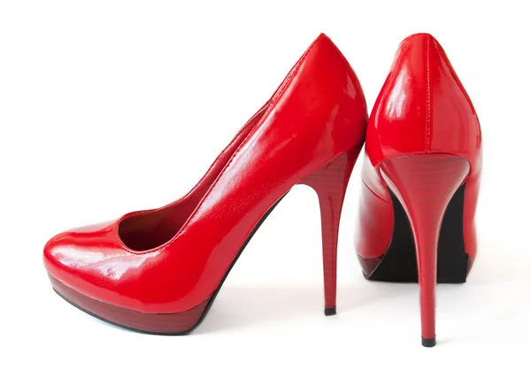 Rode schoenen paar geïsoleerd op witte achtergrond — Stockfoto