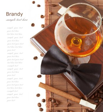 Brandy, cigar, book and coffee beans and man bow tie isolated on white background with sample text clipart