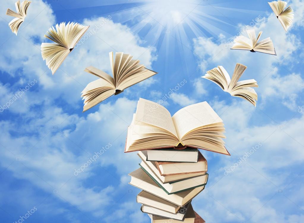 Old book pile and books flying away — Stock Photo © LessLemon 68869797