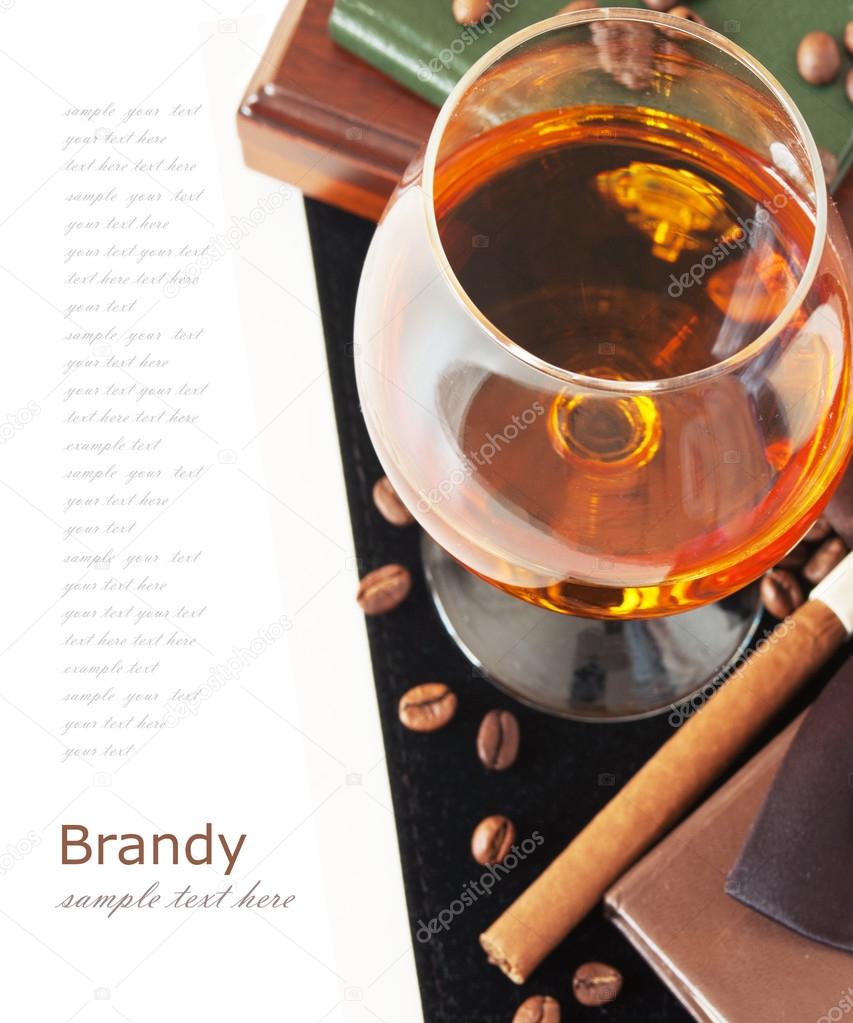 Brandy, cigar, book and coffee beans and man bow tie isolated on white background with sample text