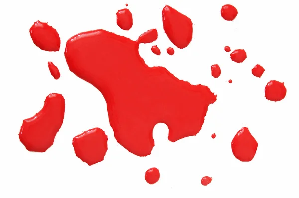 Gotas de sangre roja abstracta sobre fondo blanco. De cerca. — Foto de Stock