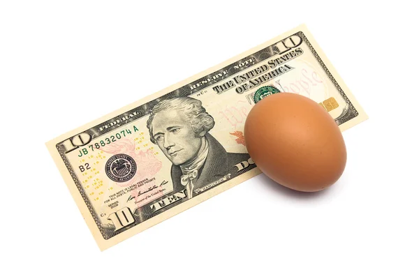 US dollar and the egg is a close-up on a white background — Stock Photo, Image