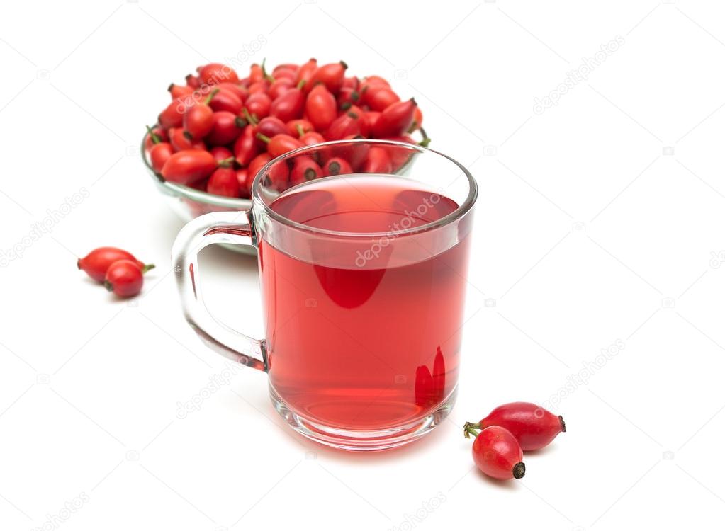 drink and rosehip berries isolated on a white background