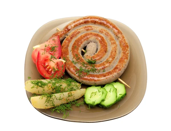 Grilled sausages with vegetables and dill on a plate close-up — Stock Photo, Image