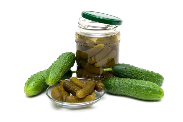 Fresh and pickled cucumbers on white background — Stock Photo, Image