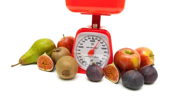 Fruit and kitchen scales isolated on white background — Stock Photo, Image