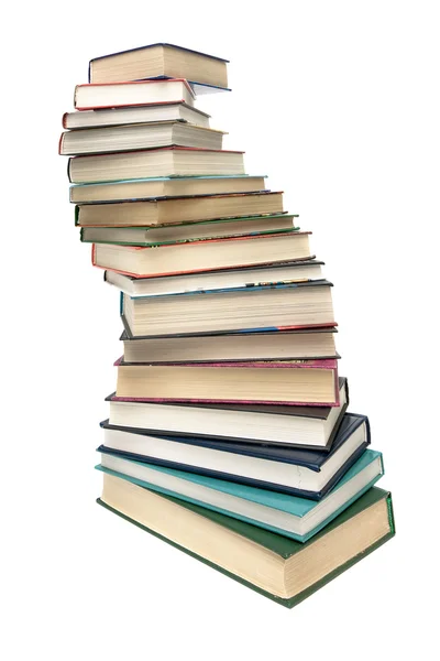 Pila di libri primo piano isolato su sfondo bianco — Foto Stock