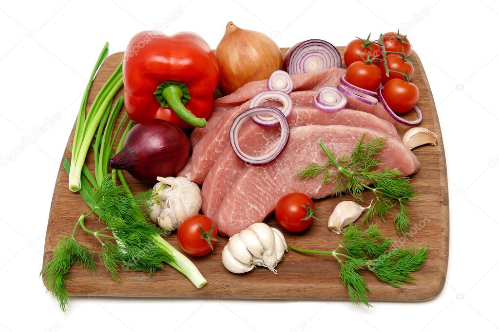 vegetables, herbs and raw meat on a white background. horizontal photo.