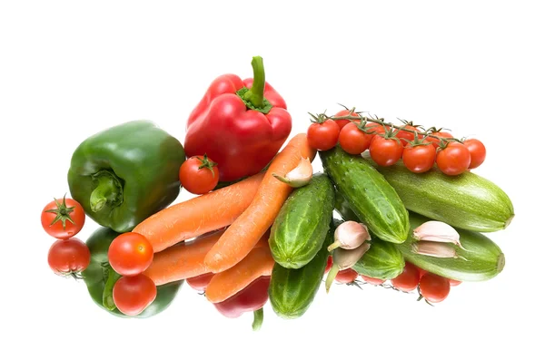 Vegetables on the mirror surface. white background. — Stock Photo, Image
