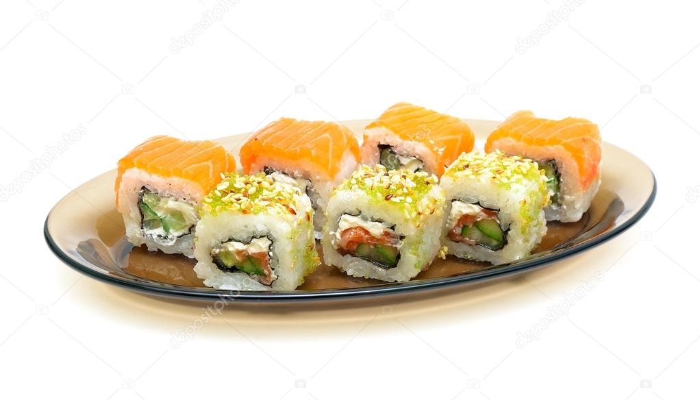 Japanese cuisine: rolls on a plate on a white background.