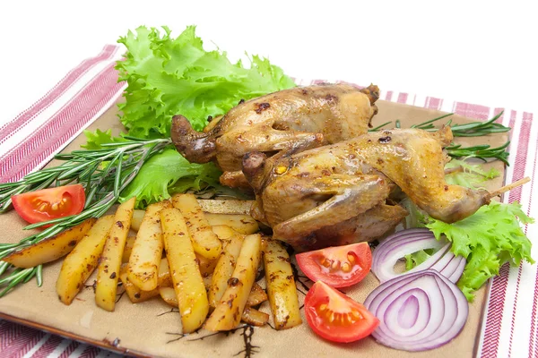 Appetizing carcass woodcock with vegetables on a plate close-up — Stock Photo, Image