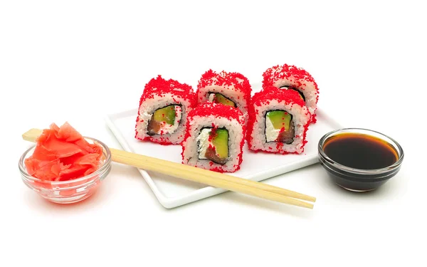 Rolls with avocado, salmon and fish roe on a plate on a white ba — Stock Photo, Image