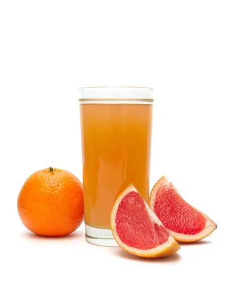 Fruit juice in a glass, tangerine and grapefruit on a white back — Stock Photo, Image