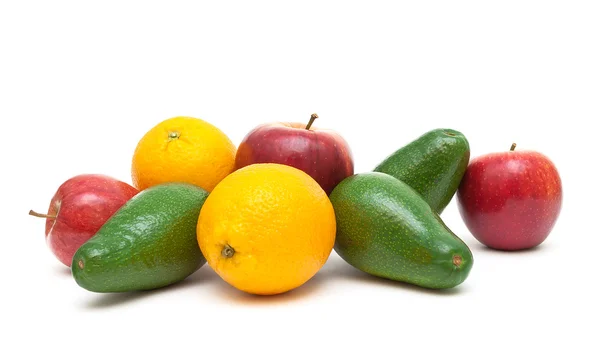 Oranges, avocado and apple isolated on a white background — Stock Photo, Image