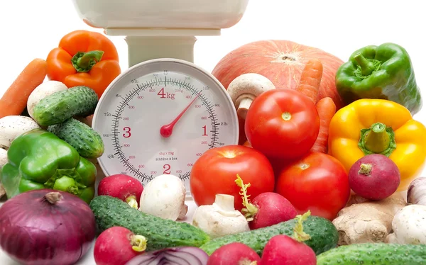 Fresh food and kitchen scale closeup — Stock Photo, Image