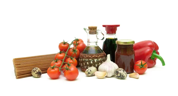 Pasta, vegetables, soy sauce, eggs and sunflower oil on a white — Stock Photo, Image