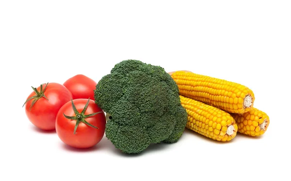 Tomatoes, broccoli and corn on the cob isolated on white backgro — Stock Photo, Image