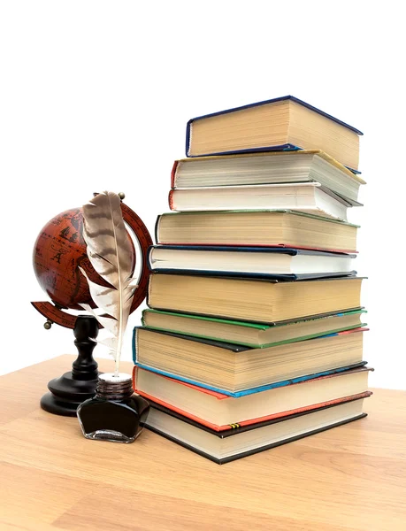 Books, globe and ink on a white background — Stock Photo, Image