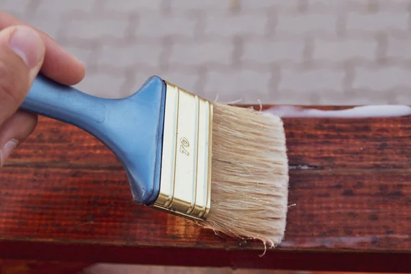 Wooden Fence Being Painted Wax Paint Paintbrush — Stock Photo, Image