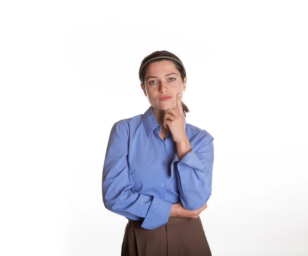 Female Spokesperson with finger on cheek — Stock Photo, Image