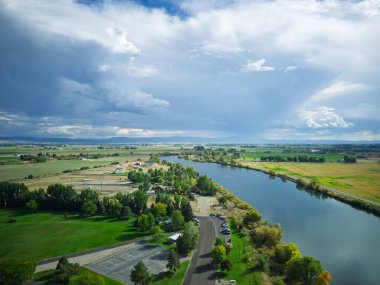The Snake River near Idaho Falls partly cloudy day