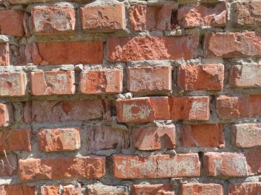 Yıpranmış eski tuğla dokusu. Eski kırmızı tuğlaların arka planı.