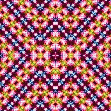 Kusursuz kaleydoskop deseni. Soyut etnik köken. Kusursuz bir doku. Yaratıcı bir geçmiş. Çizimler