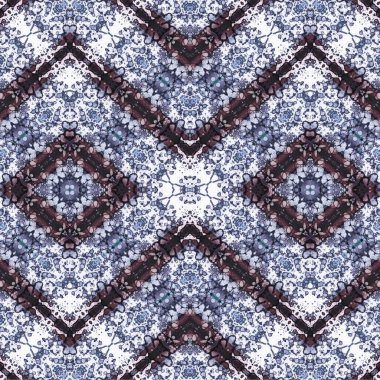 Kusursuz kaleydoskop deseni. Soyut etnik köken. Kusursuz bir doku. Yaratıcı bir geçmiş. Çizimler