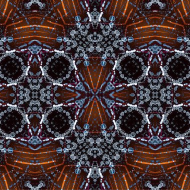 Kusursuz kaleydoskop deseni. Soyut etnik köken. Kusursuz bir doku. Yaratıcı bir geçmiş. Çizimler