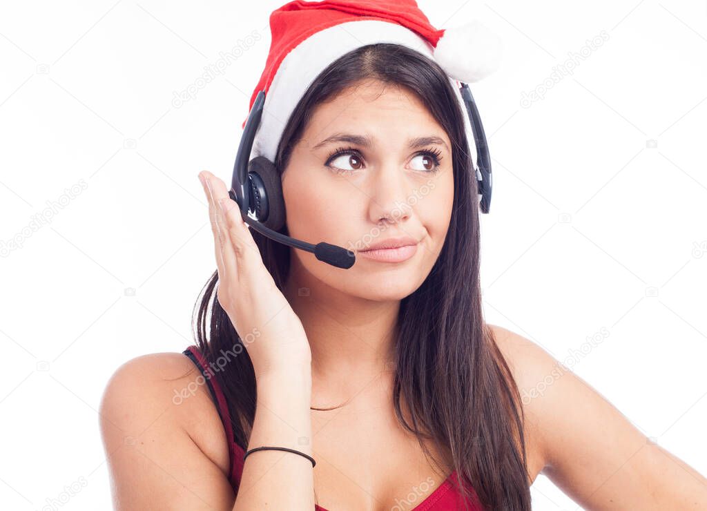 Christmas headset woman from telemarketing call center wearing red santa hat talking smiling isolated on white background.