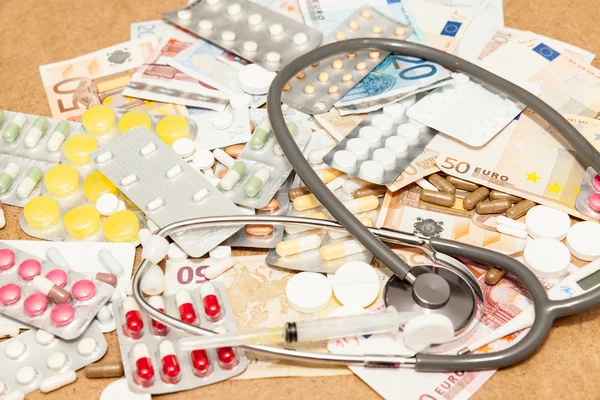 Health medications and money — Stock Photo, Image