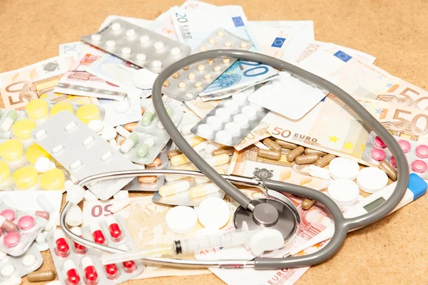 Health medications and money — Stock Photo, Image