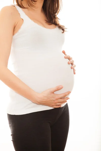Живот беременной женщины — стоковое фото