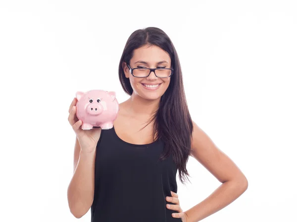 Jonge vrouw met spaarvarken bank — Stockfoto
