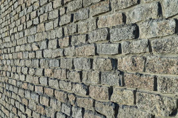 Stenen muur. granieten stenen — Stockfoto