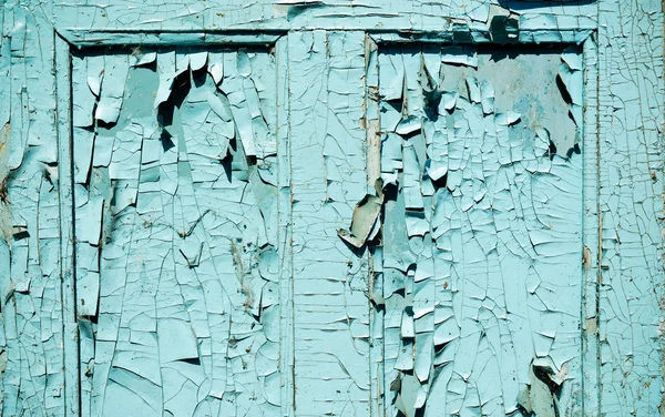 Mavi grunge kapı kırık boya ile parçası — Stok fotoğraf