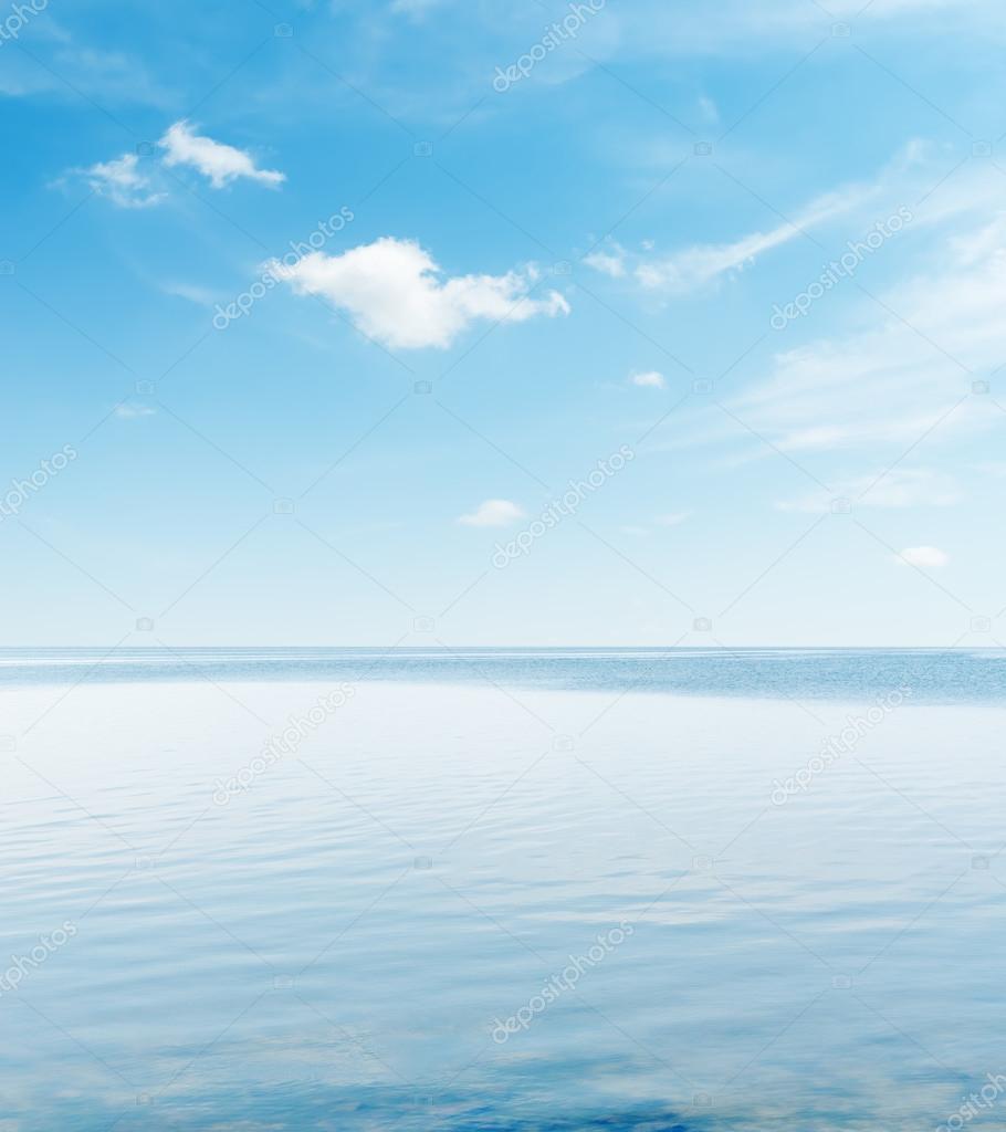 blue sky over serene sea