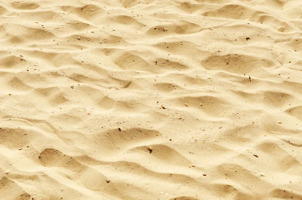 Yellow sand as texture and background — Stock Photo, Image